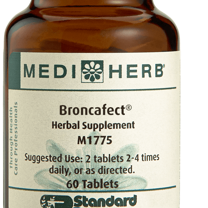A bottle of Broncafect herbal supplement next to a tablet.