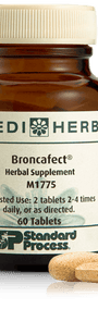 A bottle of Broncafect herbal supplement next to a tablet.