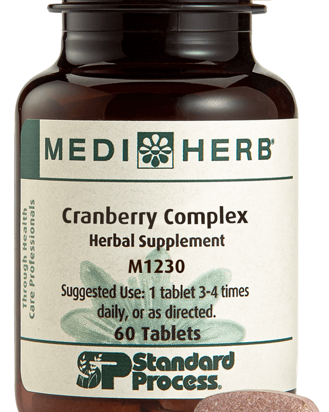 A bottle of Cranberry Complex next to a tablet.