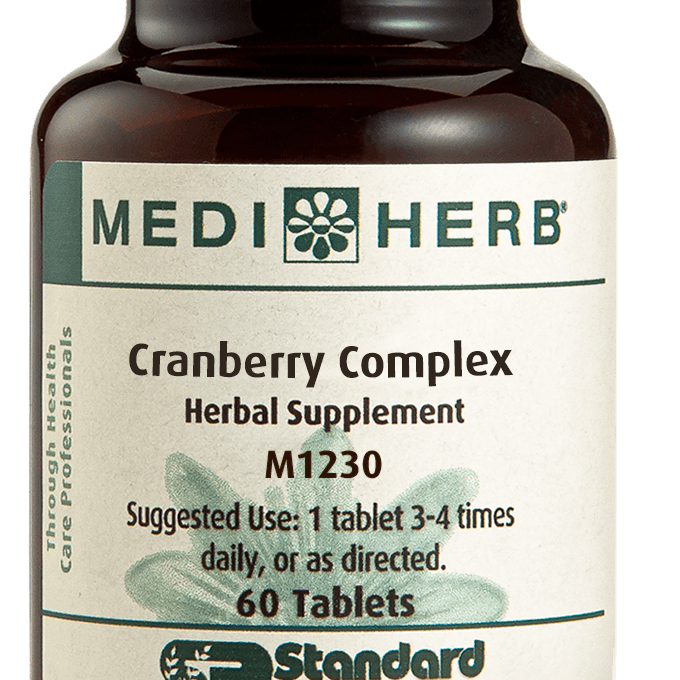 A bottle of Cranberry Complex next to a tablet.